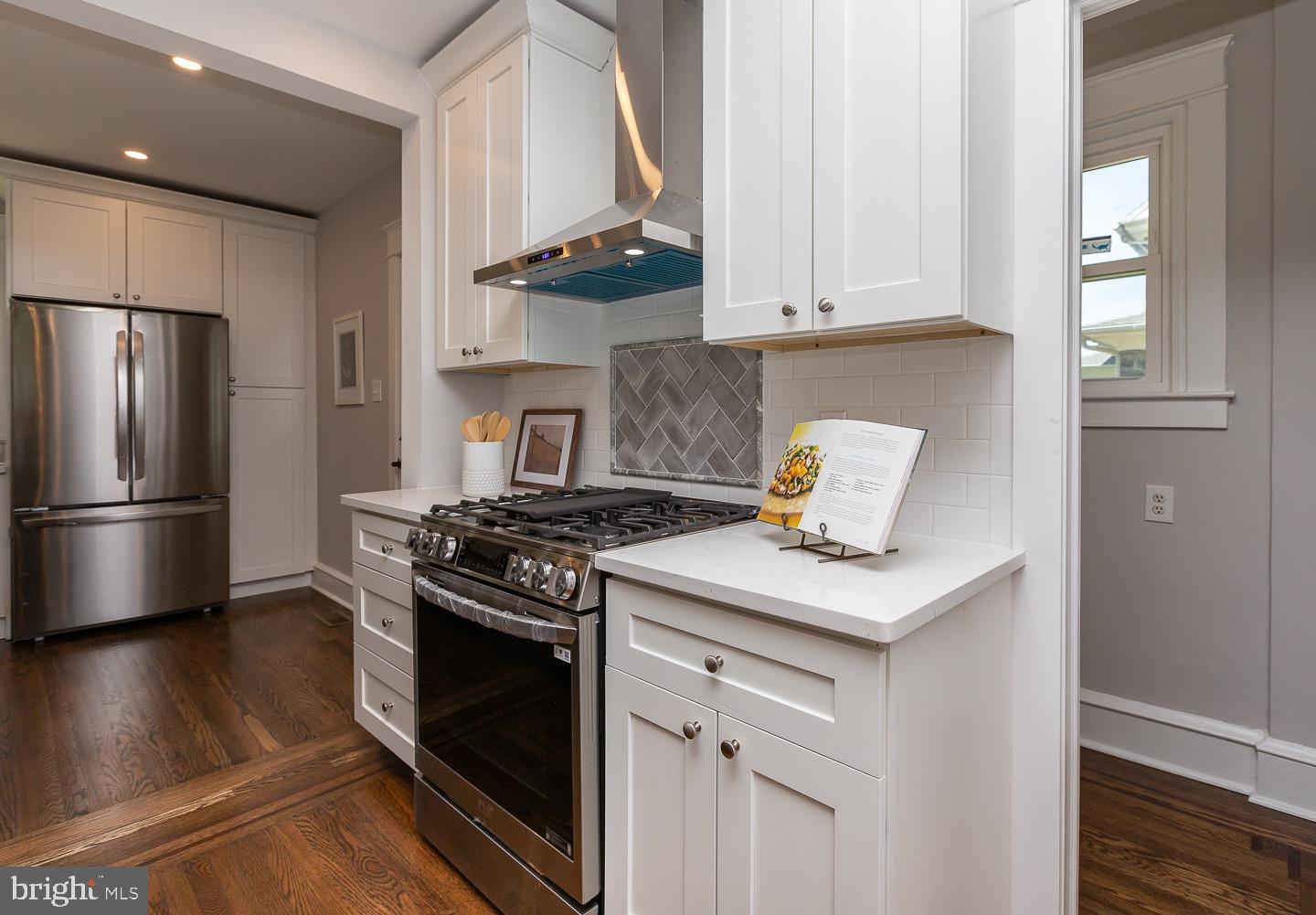 324 Strathmore Road Havertown, PA 19083 - Photo 16 of 53 a kitchen with a stove and a refrigerator