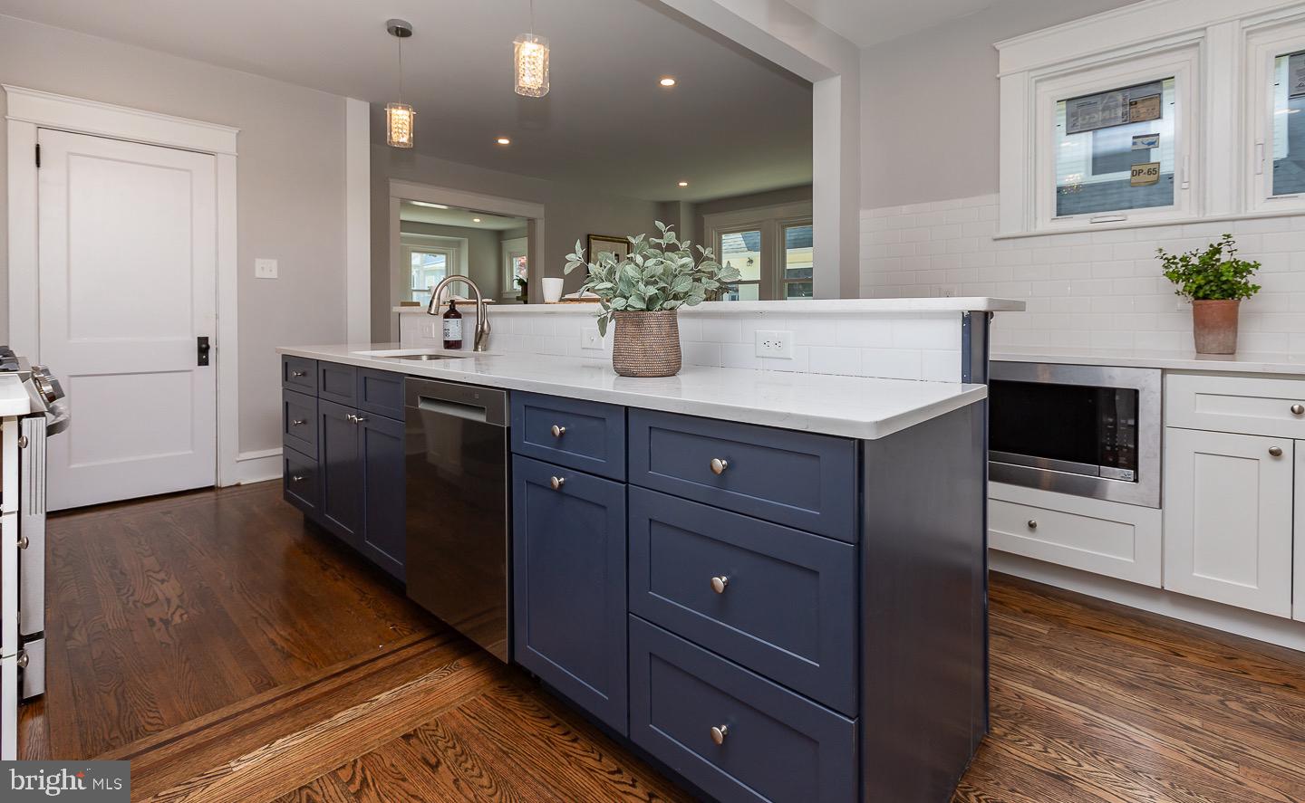 324 Strathmore Road Havertown, PA 19083 - Photo 19 of 53 a spacious bathroom with a granite countertop sink and a mirror