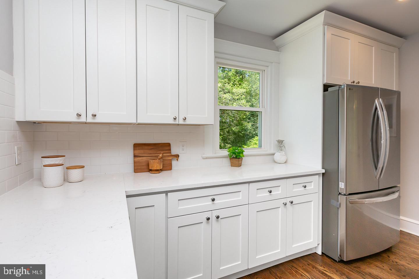 324 Strathmore Road Havertown, PA 19083 - Photo 20 of 53 a kitchen with stainless steel appliances white cabinets and a refrigerator
