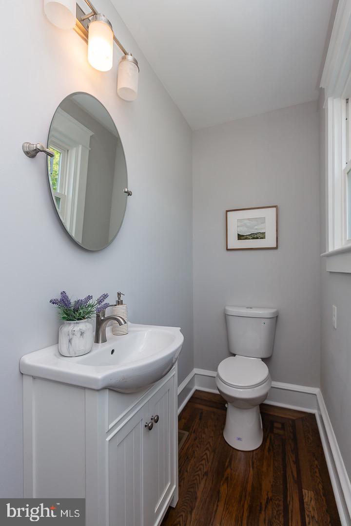 324 Strathmore Road Havertown, PA 19083 - Photo 21 of 53 a bathroom with a sink and a mirror