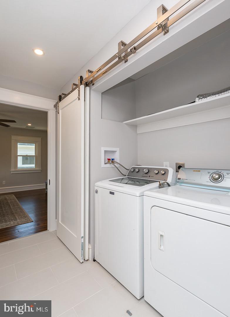 324 Strathmore Road Havertown, PA 19083 - Photo 26 of 53 a utility room with dryer and washer