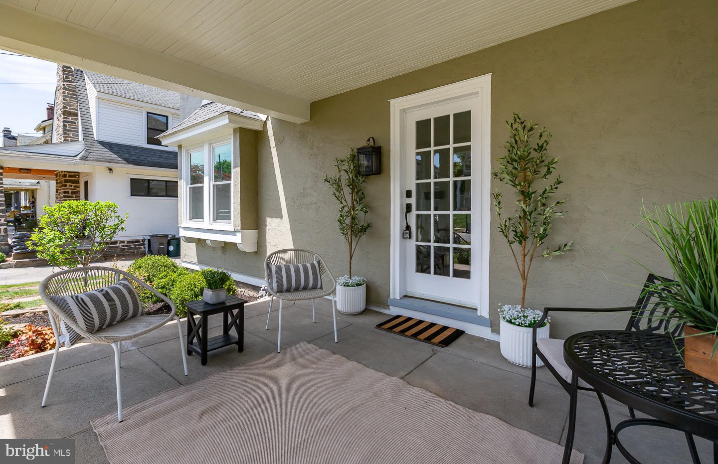 324 Strathmore Road Havertown, PA 19083 - Photo 4 of 53 a outdoor living area with furniture and a potted plant