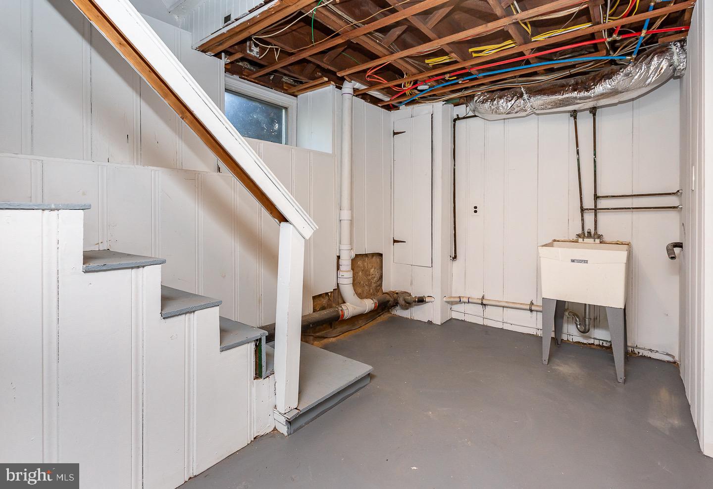 324 Strathmore Road Havertown, PA 19083 - Photo 46 of 53 a view of an empty room with stairs
