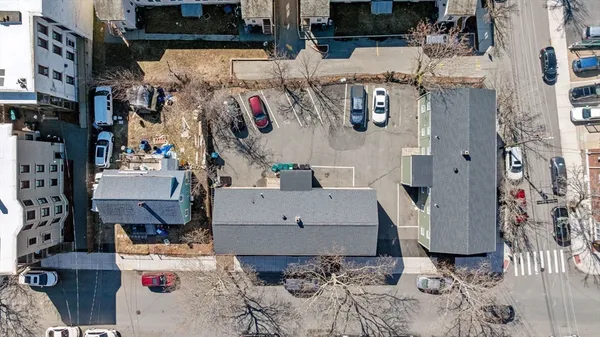 a aerial view of a building with retail shops