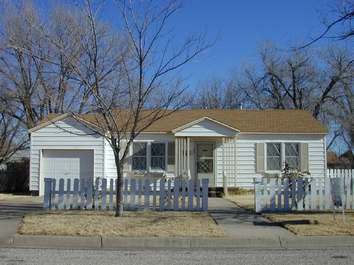 4007 South Lipscomb Street Amarillo, TX 79110 - Photo 1 of 1 front view of a house with a bench