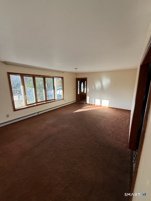 122 Cornfield Road Milford, CT 06461 - Photo 12 of 14 a view of an empty room with a window