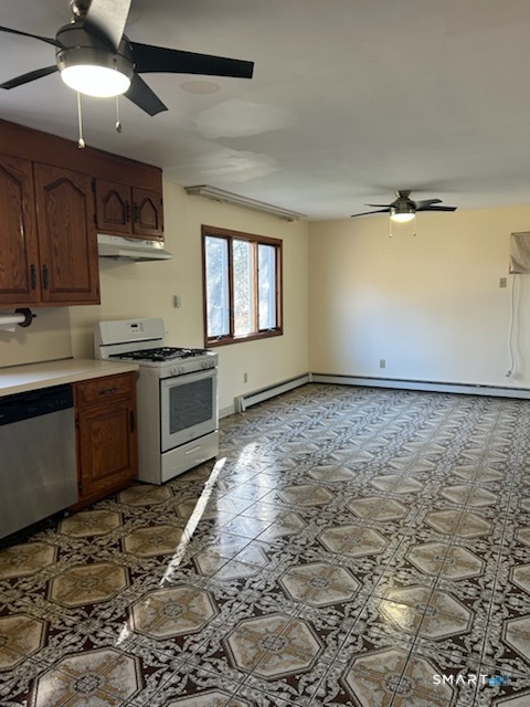 122 Cornfield Road Milford, CT 06461 - Photo 4 of 14 a view of a kitchen with a sink and cabinets