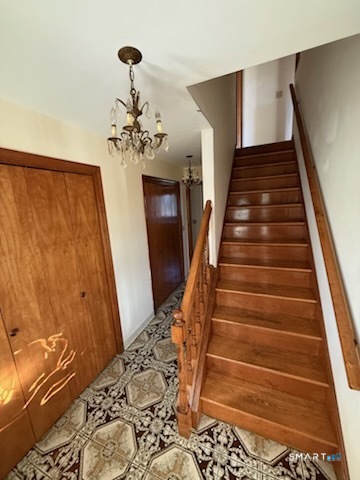 122 Cornfield Road Milford, CT 06461 - Photo 8 of 14 a view of entryway with wooden floor