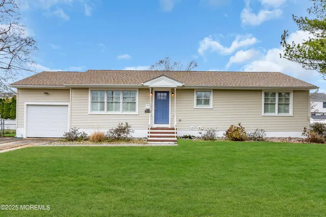 a front view of house with yard