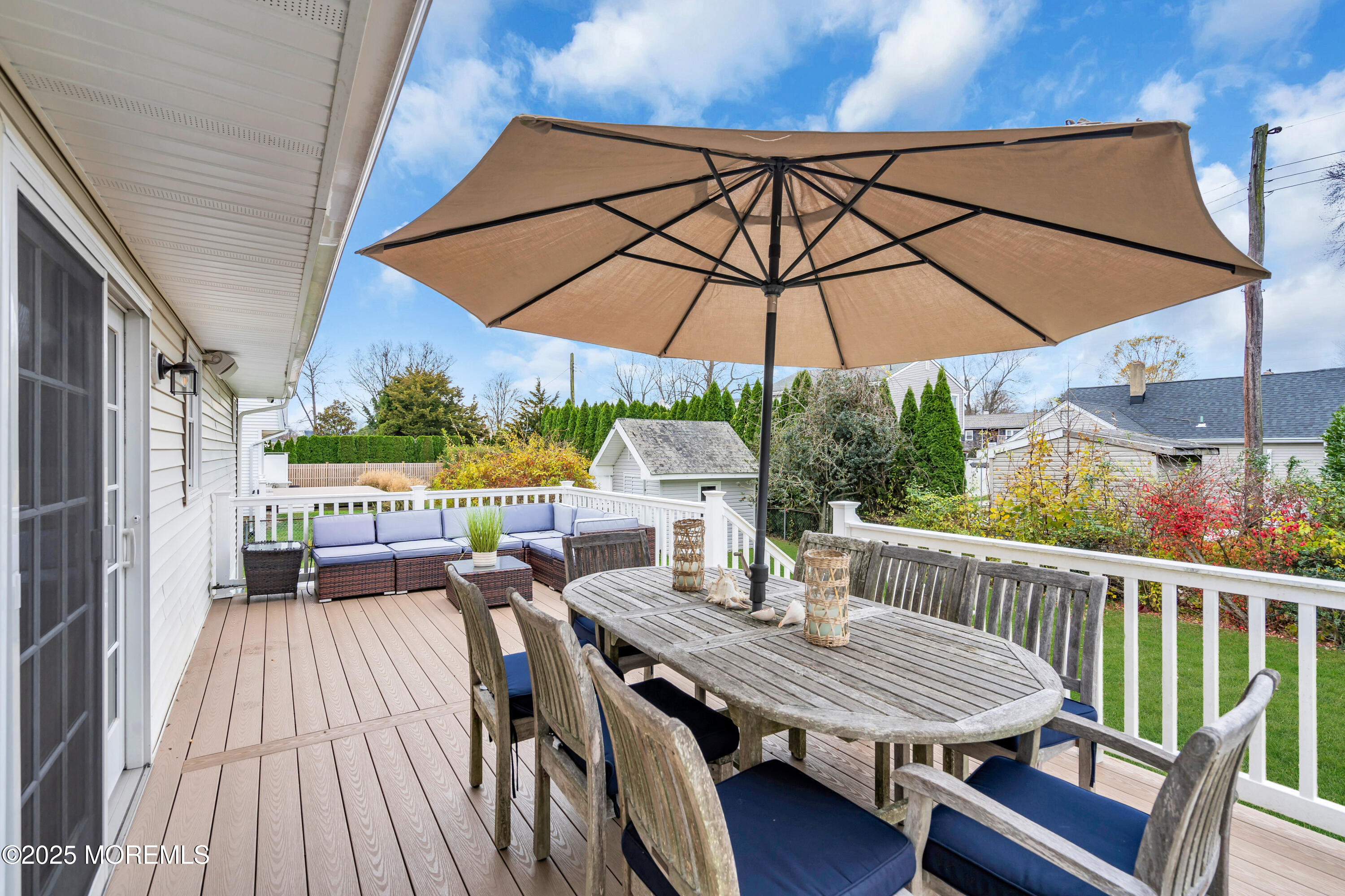 2419 Kipling Avenue Spring Lake Heights, NJ 07762 - Photo 30 of 37 a view of balcony with furniture and umbrella
