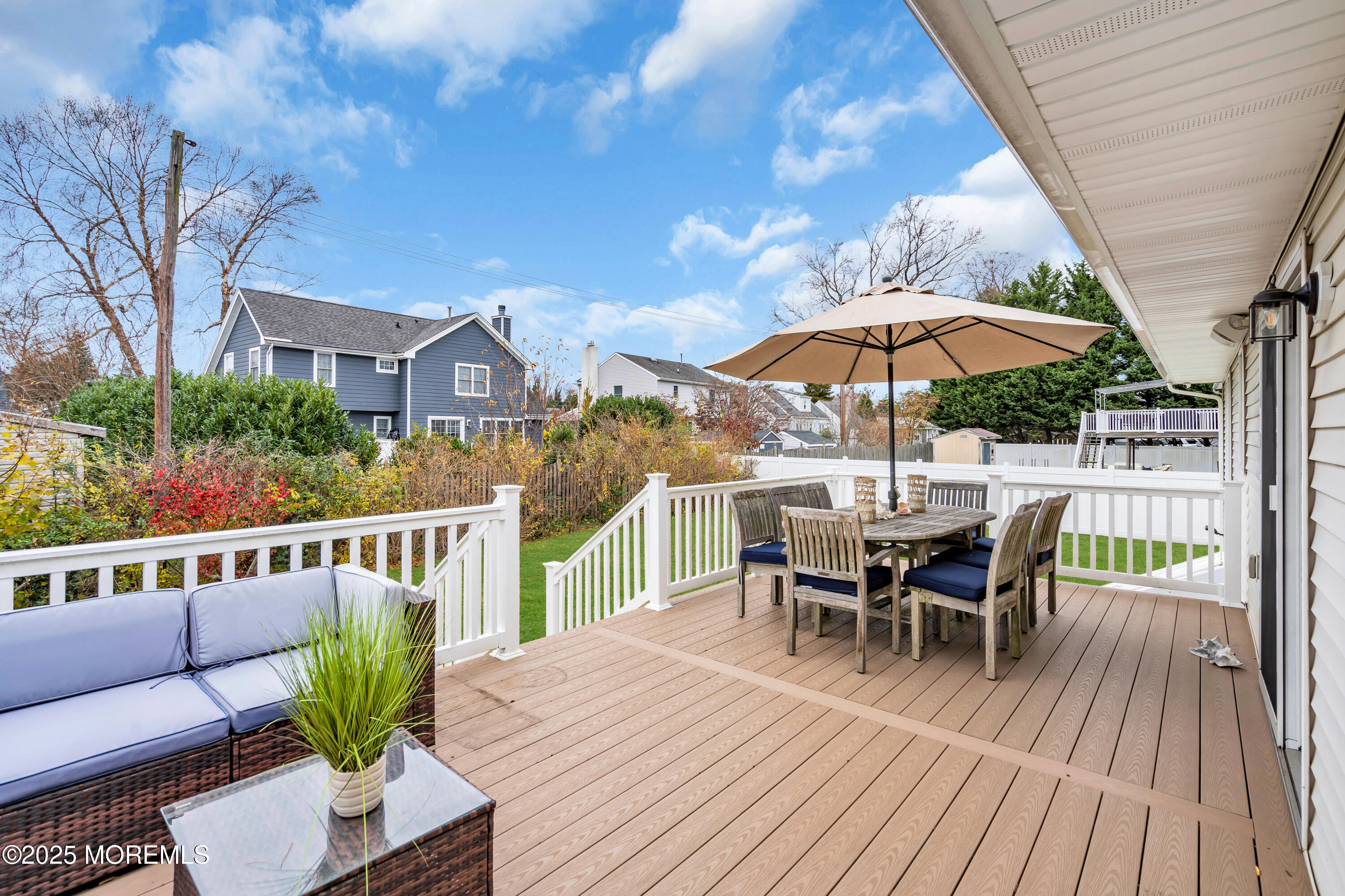 2419 Kipling Avenue Spring Lake Heights, NJ 07762 - Photo 31 of 37 a view of a house with a patio and a yard