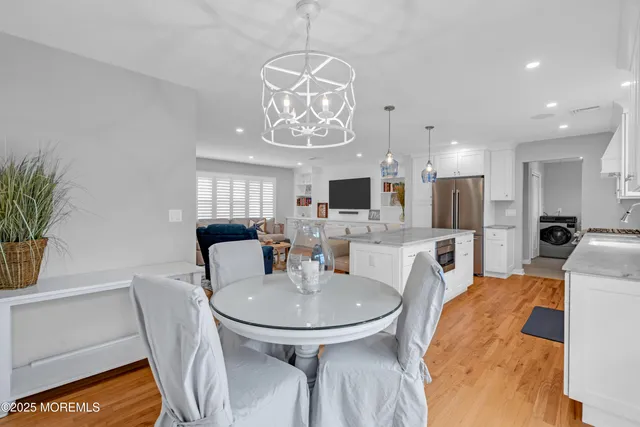 a view of a dining room with furniture