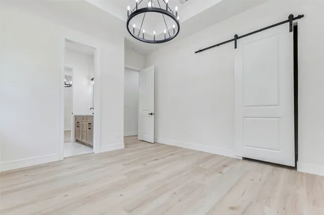 a bathroom with a double vanity sink a mirror and shower