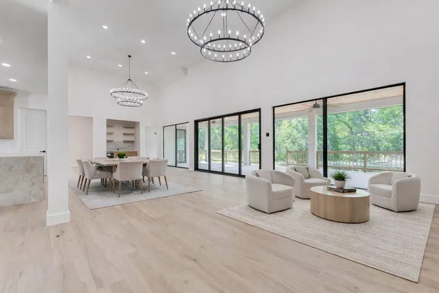 a kitchen with stainless steel appliances and white cabinets