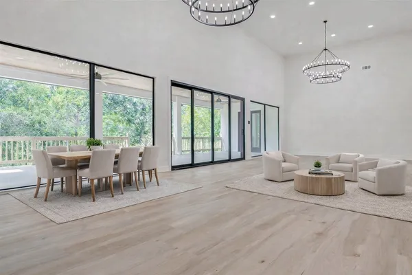 a kitchen with stainless steel appliances and white cabinets