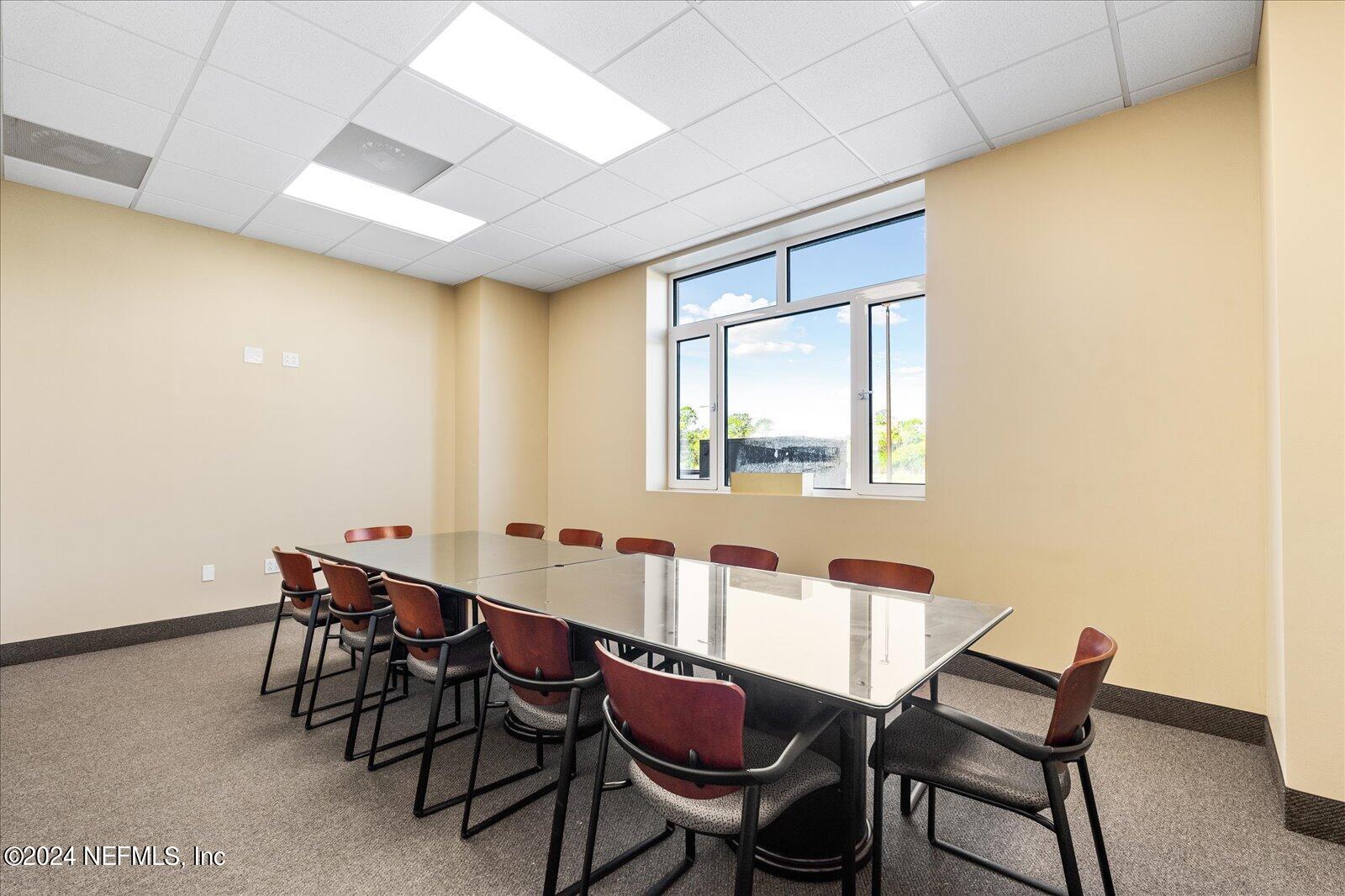6255 Colbert Lane Flagler Beach, FL 32136 - Photo 11 of 16 a dining room with furniture and window