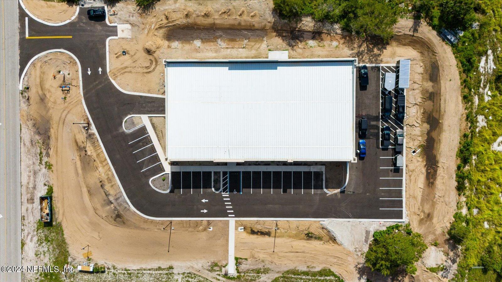 6255 Colbert Lane Flagler Beach, FL 32136 - Photo 15 of 16 a front view of a house with garden