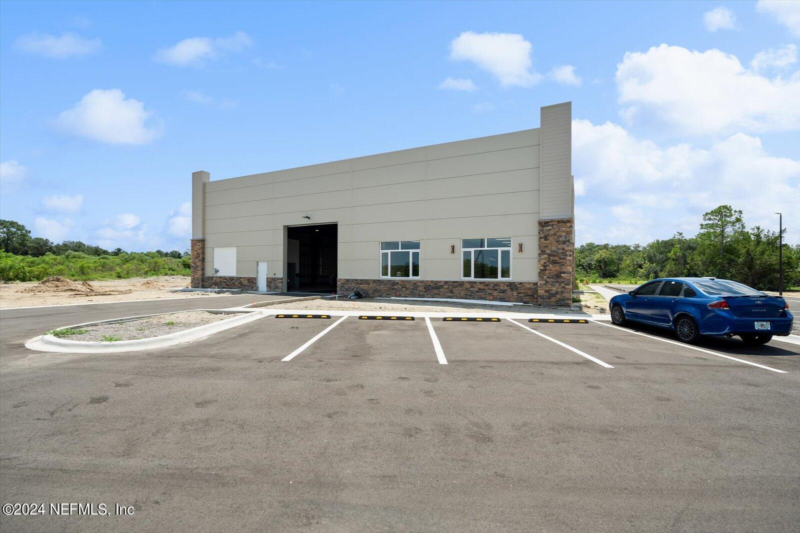 6255 Colbert Lane Flagler Beach, FL 32136 - Photo 4 of 16 a view of street with parked cars