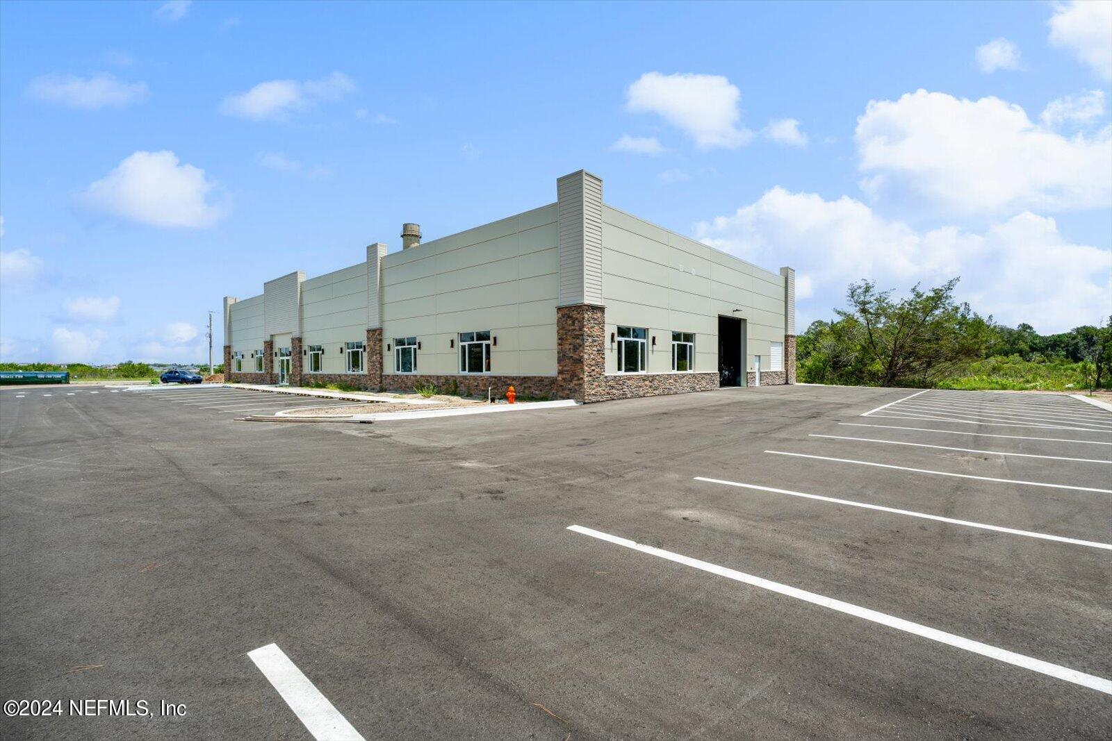 6255 Colbert Lane Flagler Beach, FL 32136 - Photo 5 of 16 a view of a house with a road