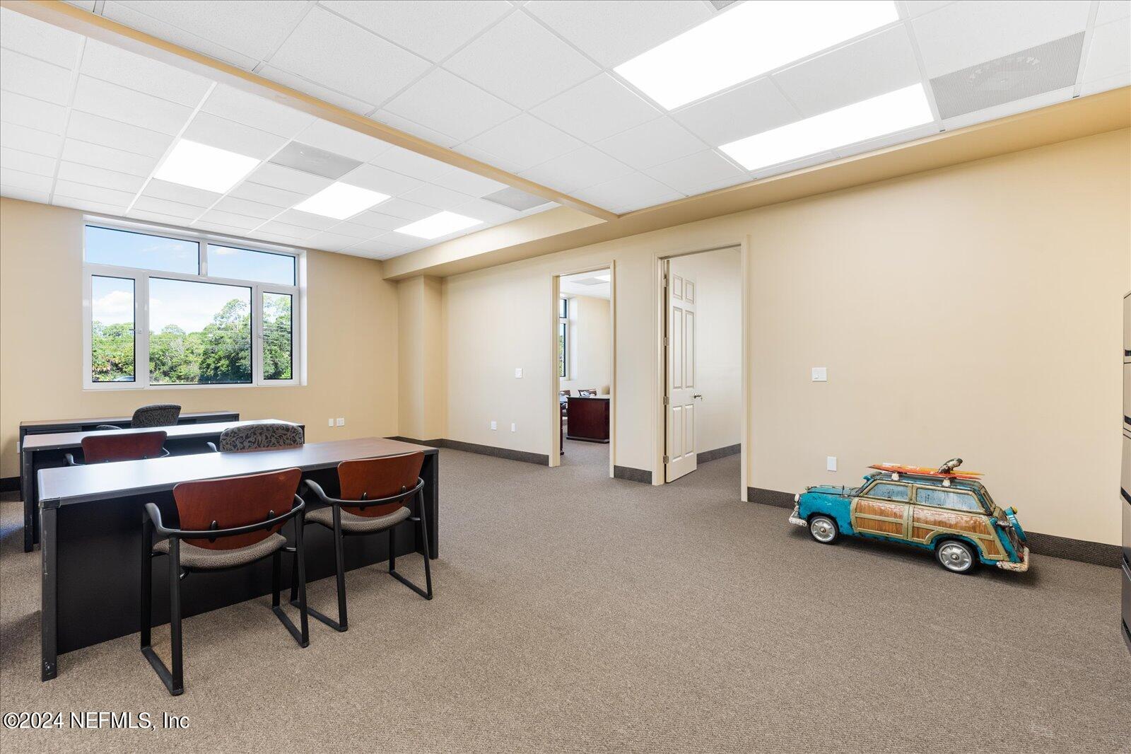 6255 Colbert Lane Flagler Beach, FL 32136 - Photo 10 of 16 a view of a room with gym equipment