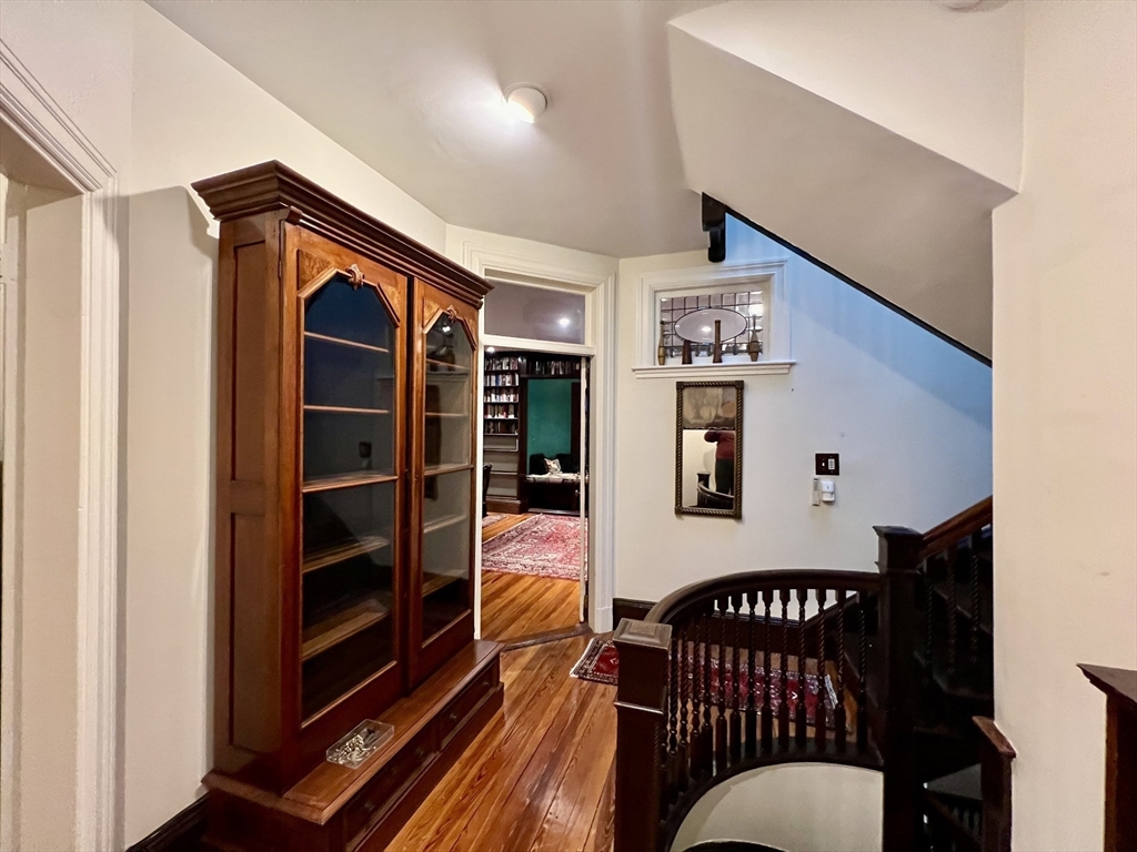 684 Washington Street Brookline, MA 02446 - Photo 10 of 30 a view of dinning room and wooden floor