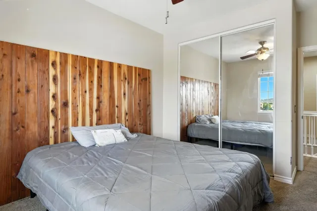 a view of a room with a wooden floor and a table