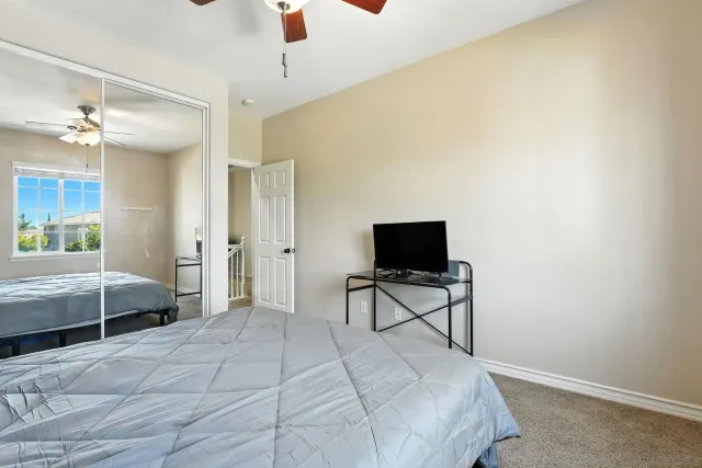 a room with furniture and a large window