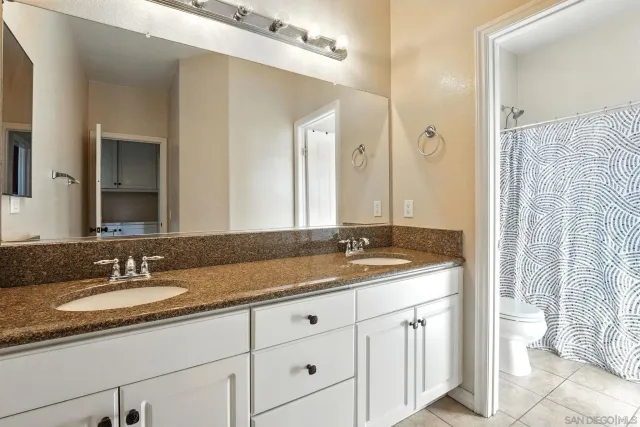 a view of balcony with a potted plants and palm trees