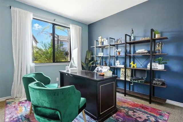 a view of a park with swings and slides