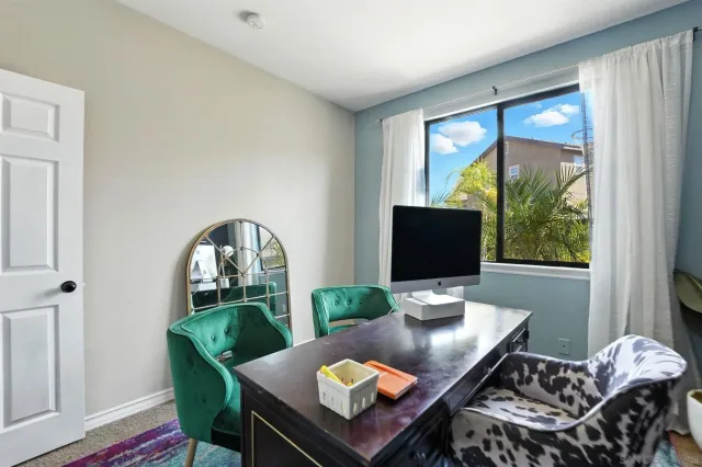 a view of a yard with a bench and a porch