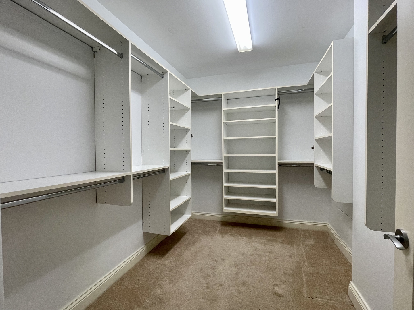 520 South Washington Street, Unit 604 Naperville, IL 60540 - Photo 15 of 32 a view of walk in closet with empty racks