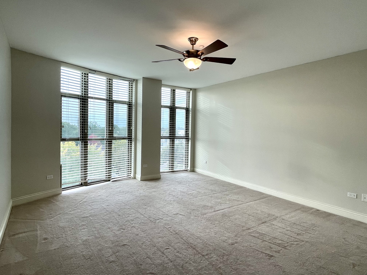 520 South Washington Street, Unit 604 Naperville, IL 60540 - Photo 18 of 32 a view of an empty room with a window