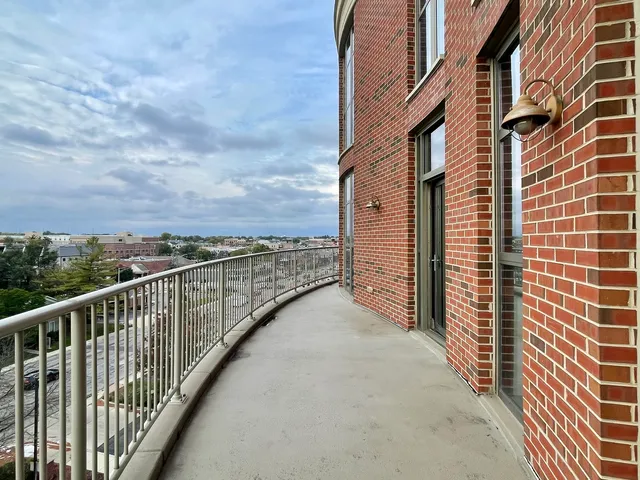 a view of a balcony with city view
