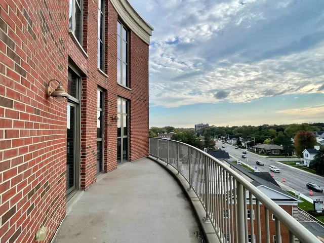 a view of a balcony with city view