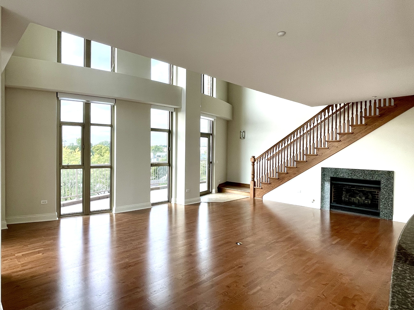 520 South Washington Street, Unit 604 Naperville, IL 60540 - Photo 3 of 32 a view of an entryway with wooden floor and a living room
