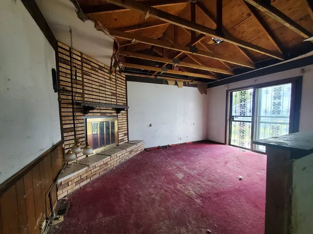 a view of a livingroom with a fireplace