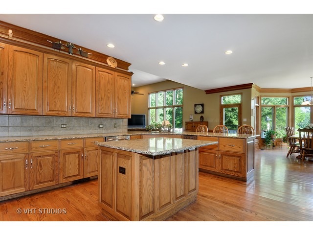 3737 Wolf Road Oswego, IL 60543 - Photo 6 of 25 a kitchen with lots of counter top space