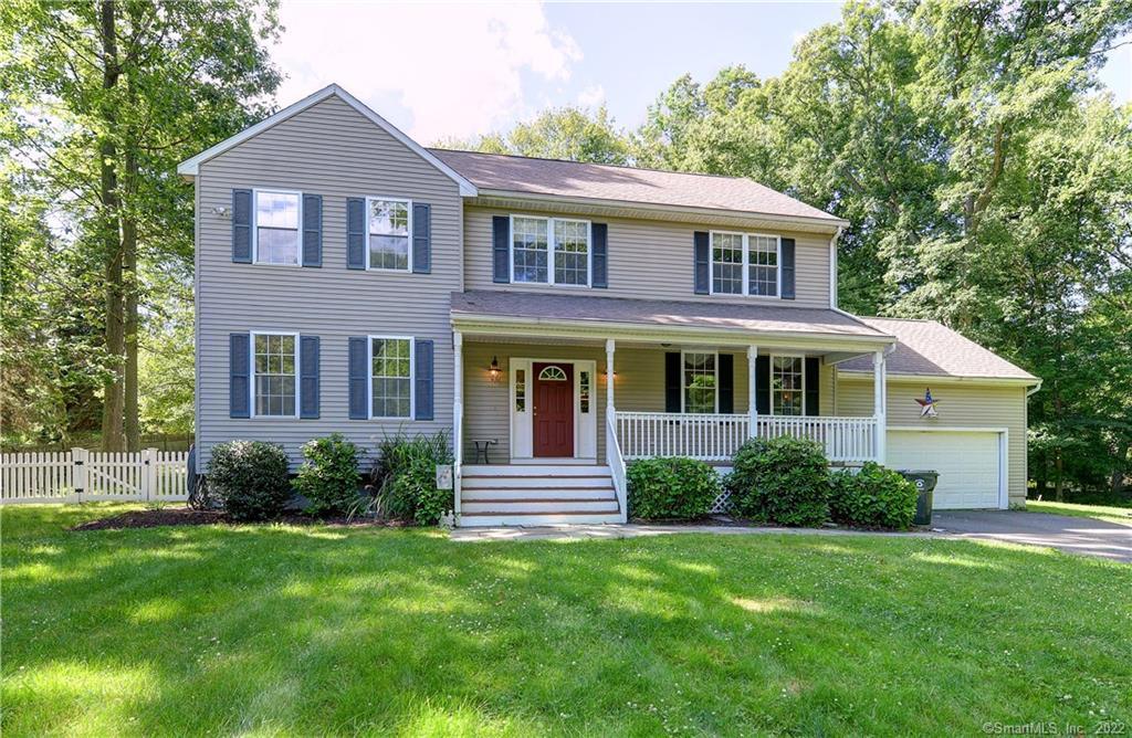 21 Old Green Road Trumbull, CT 06611 - Photo 1 of 1 a front view of a house with a yard