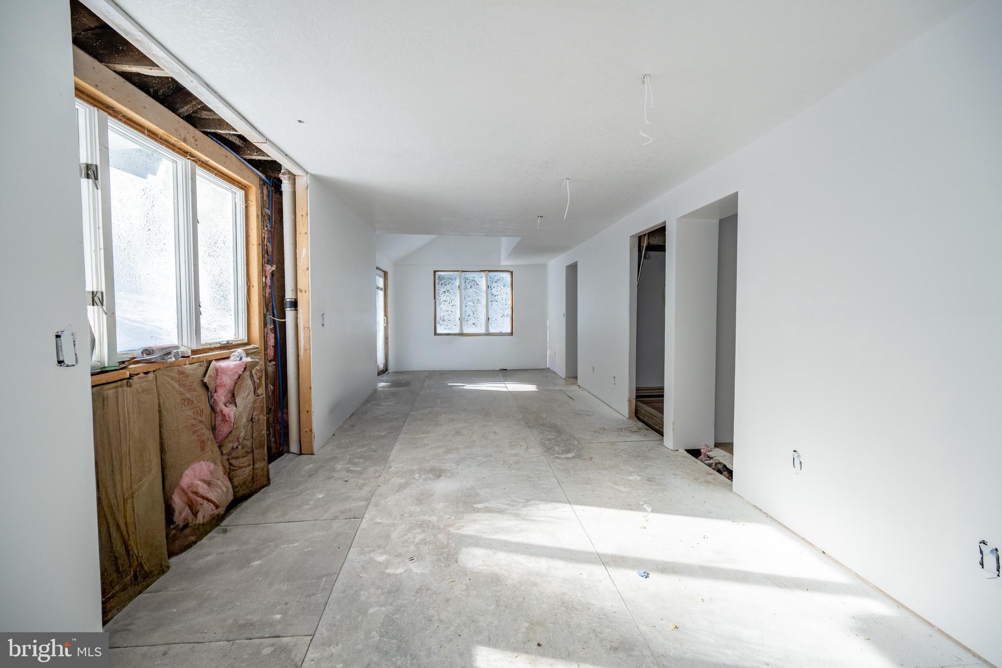 43 Sloan Tract Road Oakland, MD 21550 - Photo 13 of 47 Spacious, sunlit room ready for transformation.