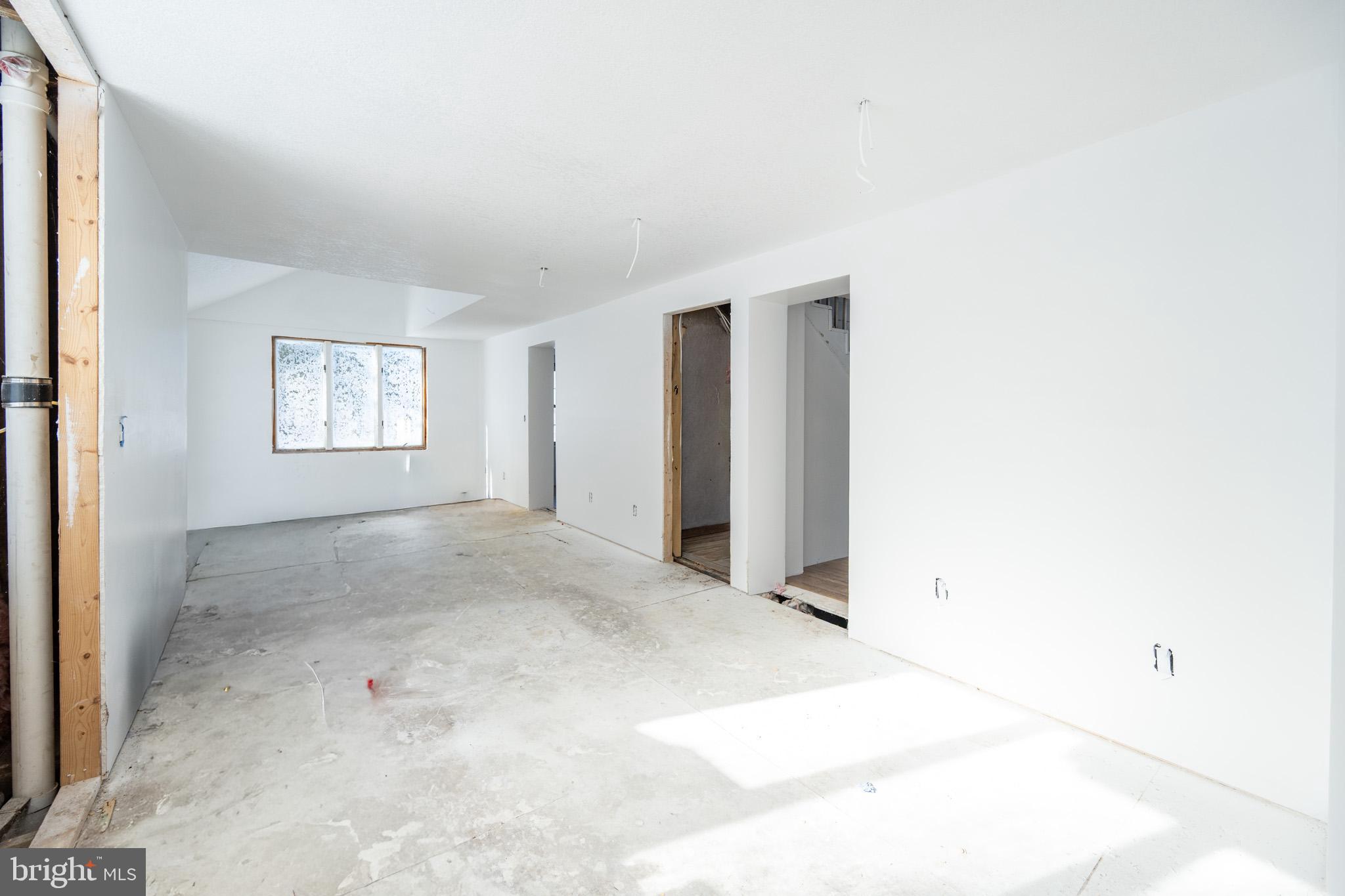 43 Sloan Tract Road Oakland, MD 21550 - Photo 15 of 47 Bright, open space ready for transformation.