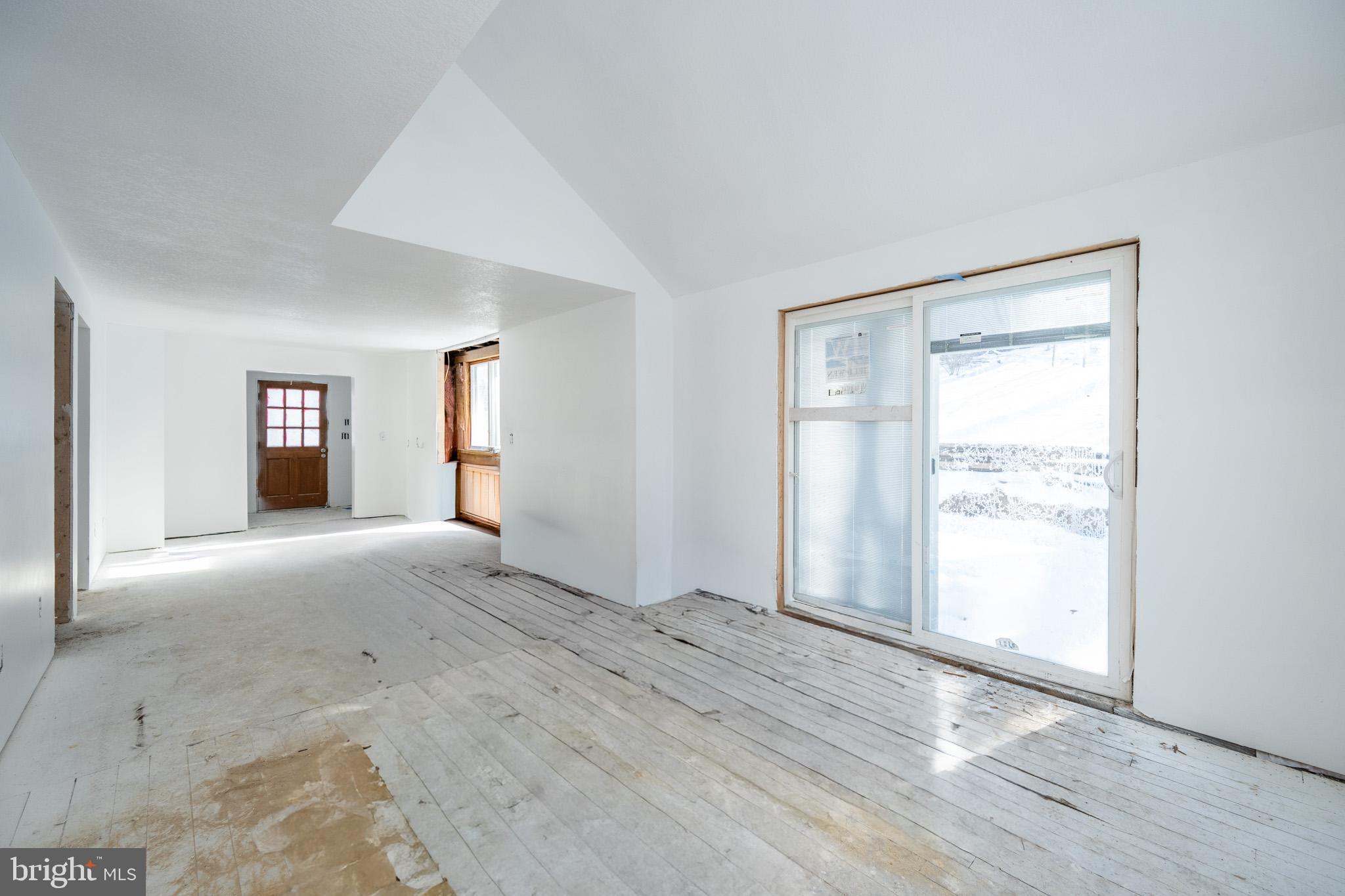 43 Sloan Tract Road Oakland, MD 21550 - Photo 17 of 47 Spacious, light-filled room ready for dreams.