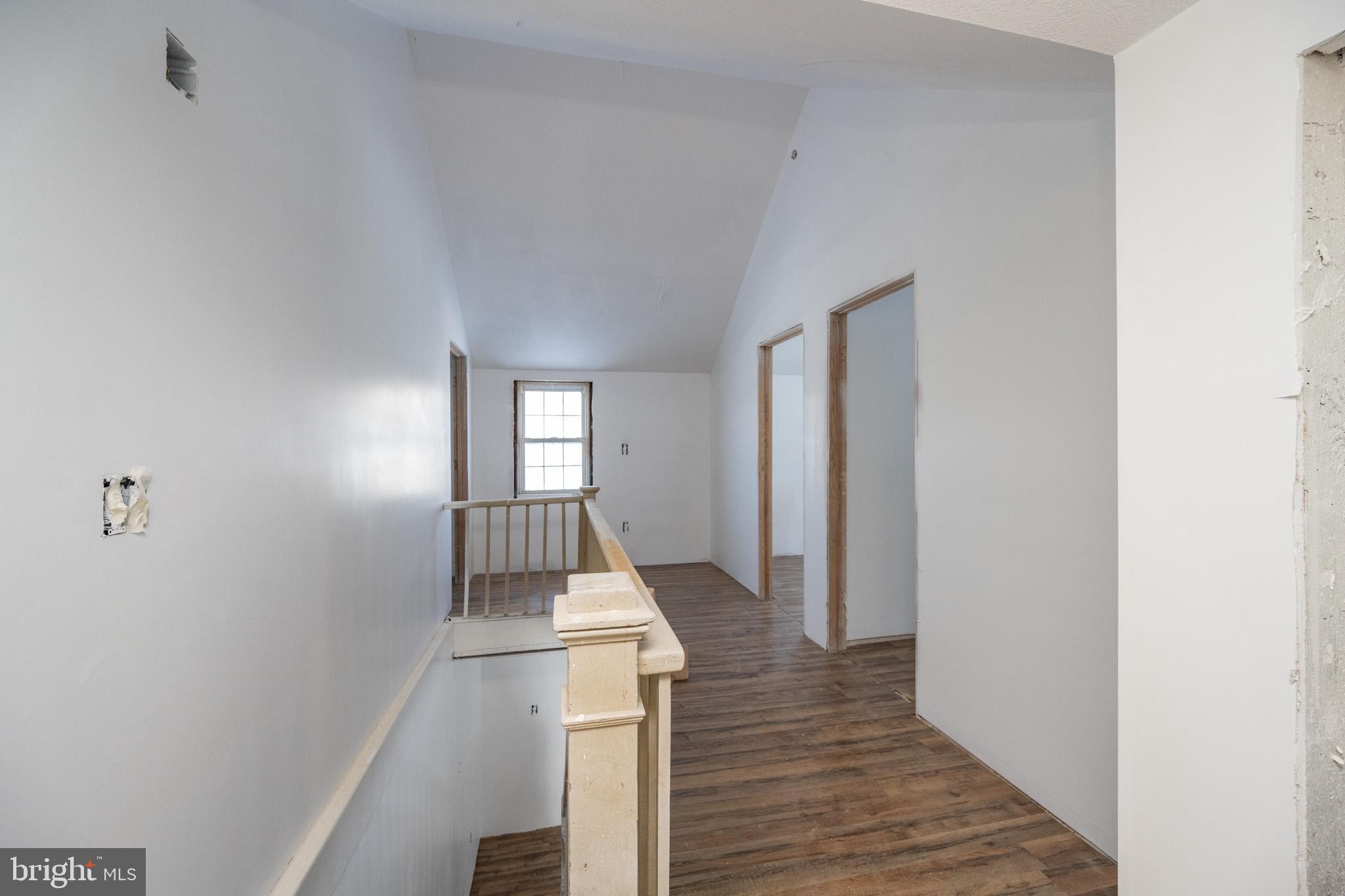 43 Sloan Tract Road Oakland, MD 21550 - Photo 29 of 47 Bright and airy hallway with natural light.