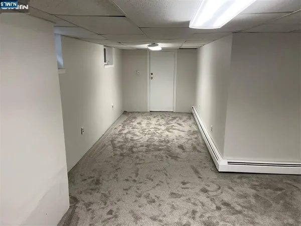 a view of a room with an empty space