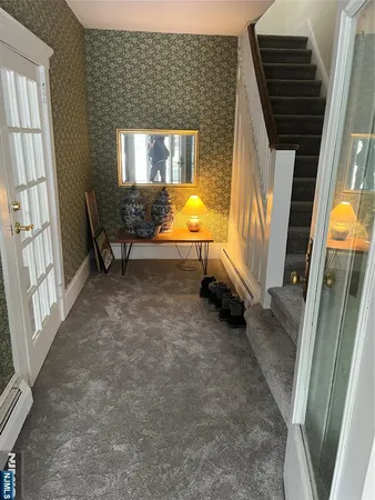 a view of an entryway with a livingroom