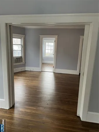 a view of livingroom with hardwood floor and window