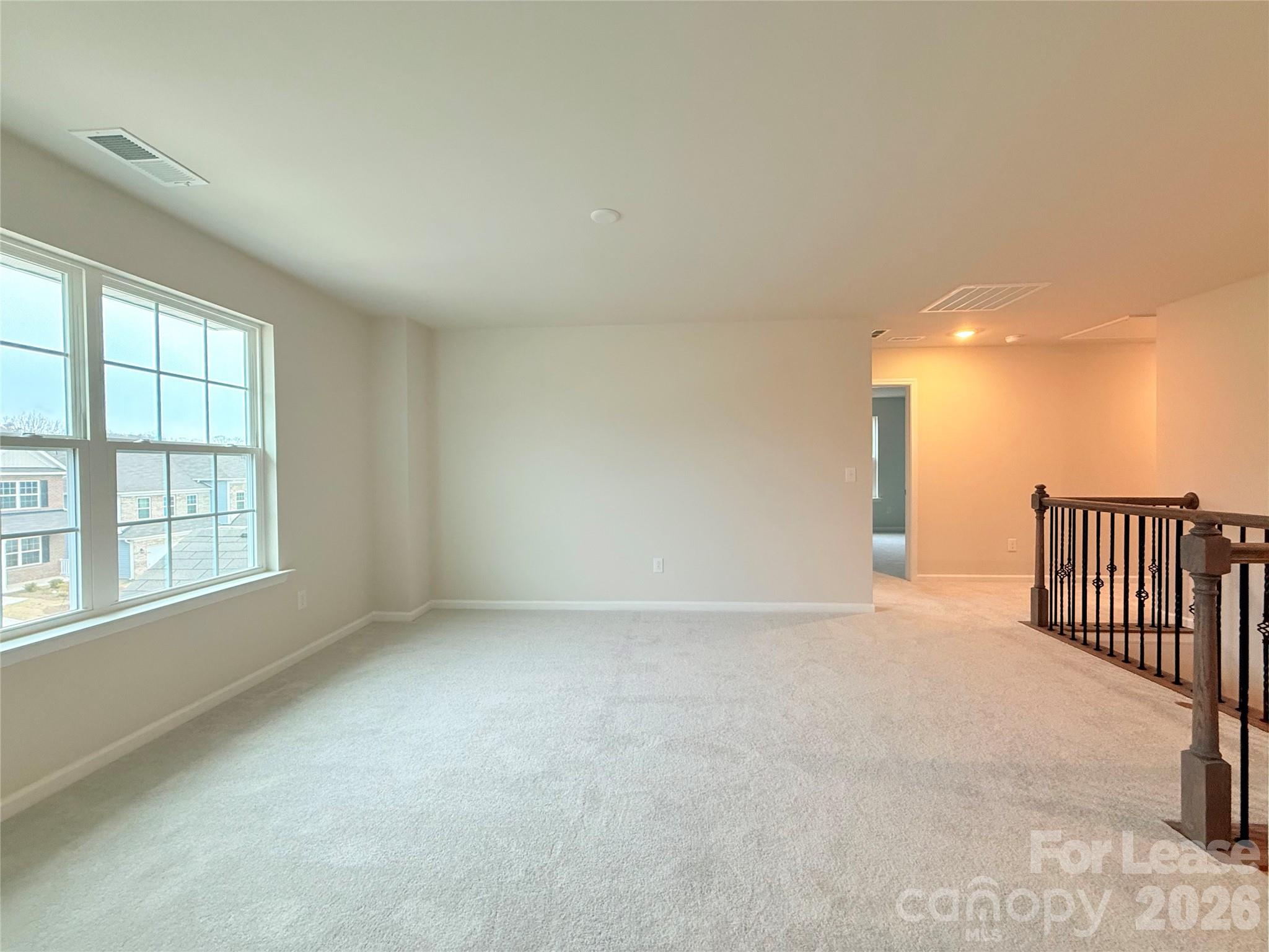4345 Shimmering Stone Way Maiden, NC 28650 - Photo 14 of 27 a view of an empty room with a window