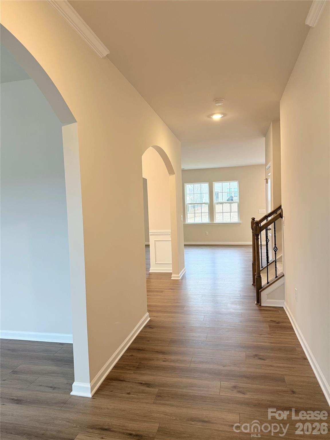 4345 Shimmering Stone Way Maiden, NC 28650 - Photo 2 of 27 a view of empty room with wooden floor and fan