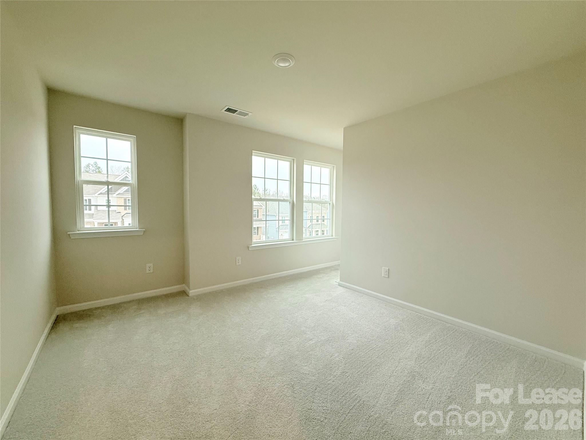 4345 Shimmering Stone Way Maiden, NC 28650 - Photo 21 of 27 an empty room with windows