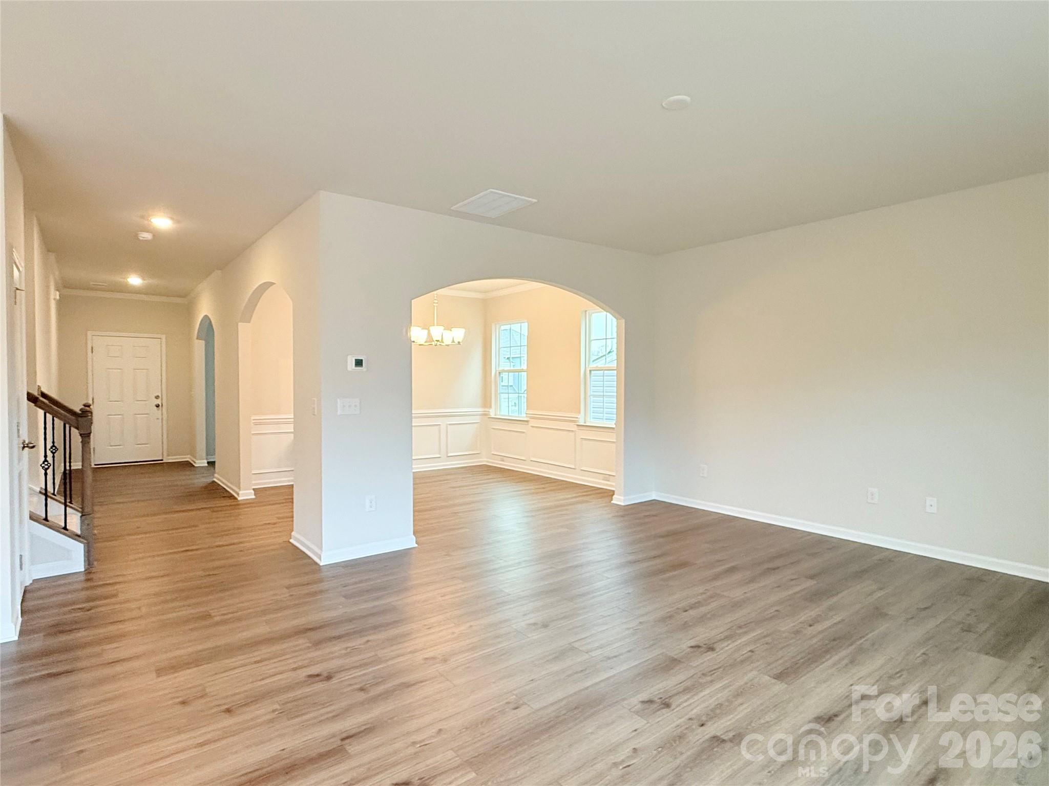 4345 Shimmering Stone Way Maiden, NC 28650 - Photo 5 of 27 a view of an empty room and wooden floor