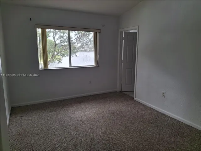 wooden floor and cabinet in a room